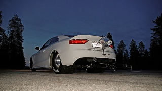 Illustration for article titled Watch an Audi A5 transform into a drag car
